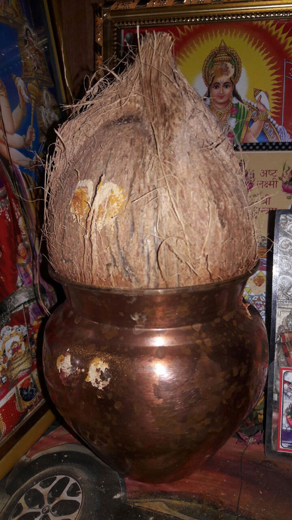 kalash with coconut and copper container