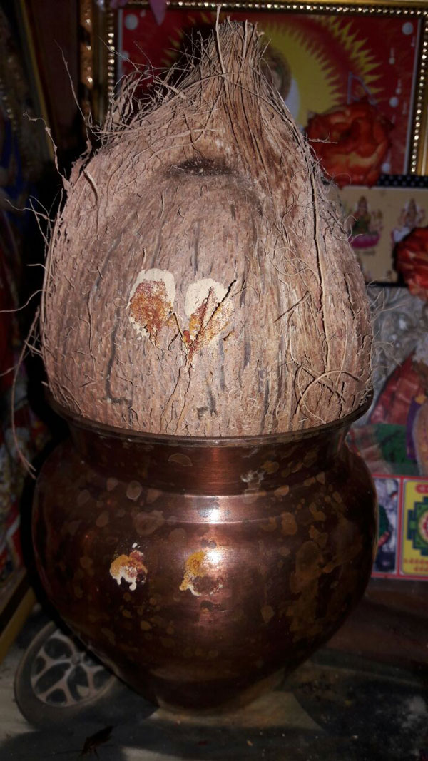 kalash with coconut and copper container